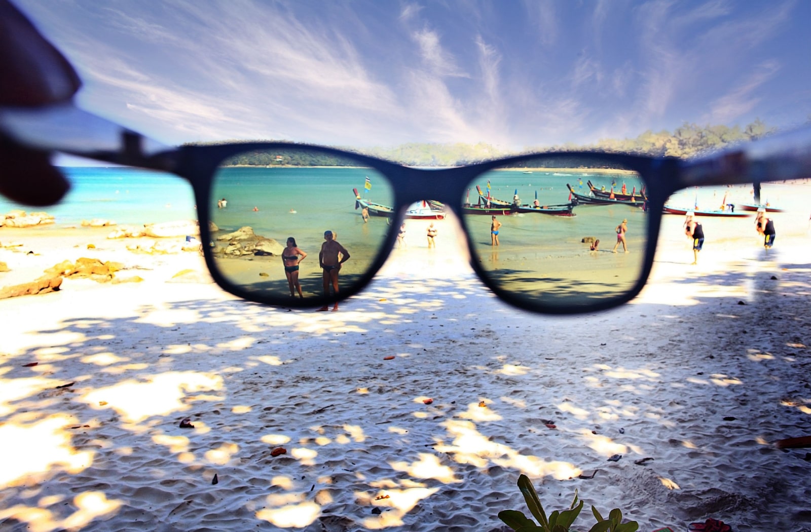 A view of a beach through polarized sunglasses.