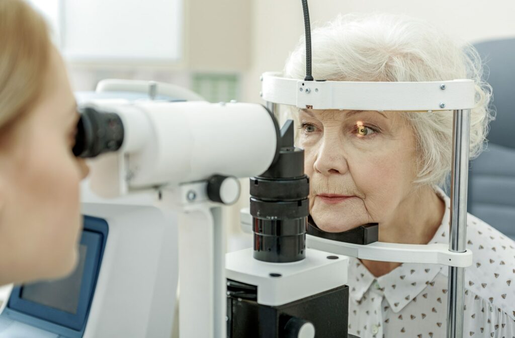 Close-up of an older woman undergoing a slit-lamp exam