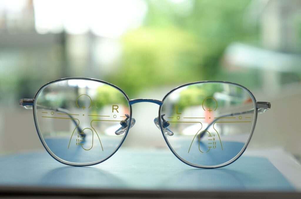 Progressive eyeglasses with diagrams on the lens showing how their lens power works.